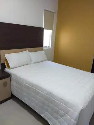 Cama o camas de una habitación en Hotel del Bosque