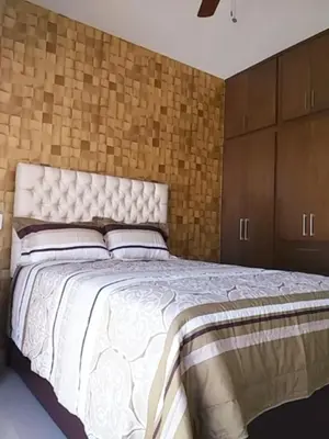 Cama o camas de una habitación en RENTA VACACIONAL A 2 CUADRAS DE LA PLAYA O MALECON DE MAZATLAN