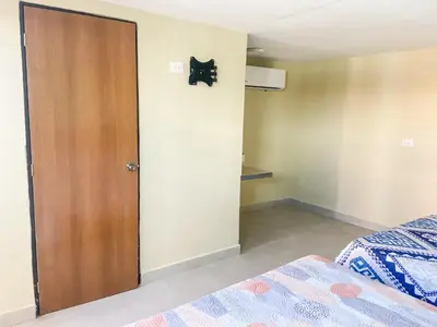 Cama o camas de una habitación en Posada Vacacional Brisas del Mar