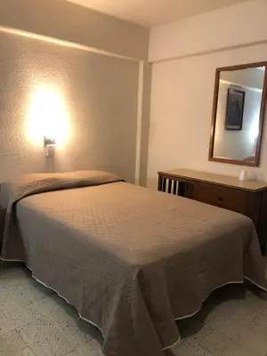 Cama o camas de una habitación en Hotel Lorena
