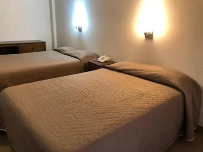 Cama o camas de una habitación en Hotel Lorena
