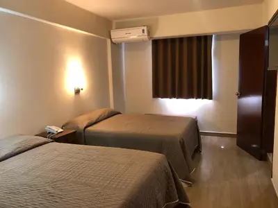 Cama o camas de una habitación en Hotel Lorena