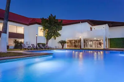 Piscina en o cerca de Days Inn by Wyndham Piedras Negras