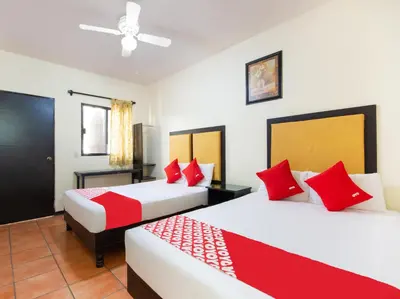 Cama o camas de una habitación en HOTELES CATEDRAL Torreón