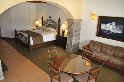 Cama o camas de una habitación en Hotel Quinta Mision