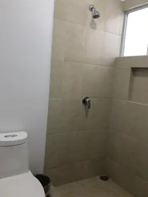 Un baño de CASA EN PRIVADA FRENTE A LA PLAYA CON ALBERCA!