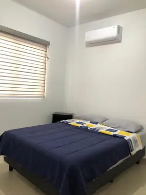 Cama o camas de una habitación en CASA EN PRIVADA FRENTE A LA PLAYA CON ALBERCA!