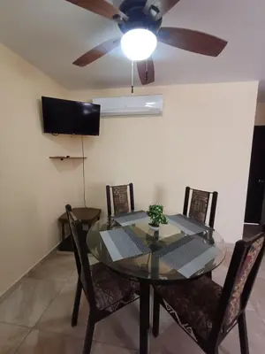 Una televisión o centro de entretenimiento en Casa Sendero