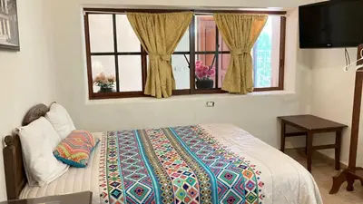 Cama o camas de una habitación en Mansion Serrano Hotel