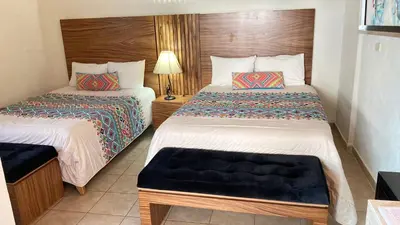 Cama o camas de una habitación en Mansion Serrano Hotel