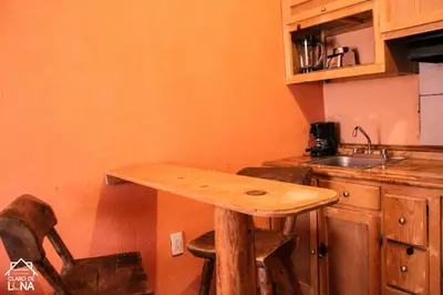 Una cocina o zona de cocina en Cabañas Claro de Luna