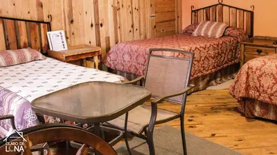 Cama o camas de una habitación en Cabañas Claro de Luna