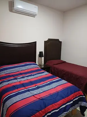 Cama o camas de una habitación en Casa Las Camelias