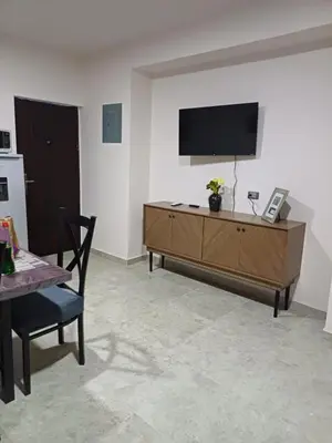 Una televisión o centro de entretenimiento en Casa Las Camelias