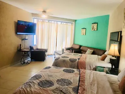 Cama o camas de una habitación en Estudio Frente Al Mar Posada