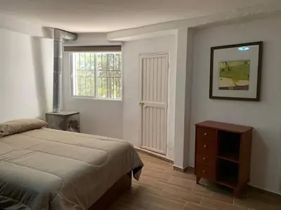 Cama o camas de una habitación en CASA DEL ARBOL en la Sierra de Durango
