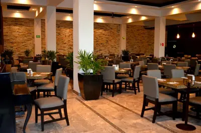 Un restaurante o sitio para comer en Hotel El Sembrador
