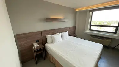 Cama o camas de una habitación en Hotel El Sembrador