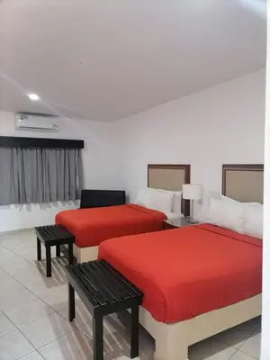 Cama o camas de una habitación en Hotel Marina Topolobampo