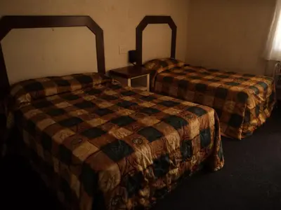 Cama o camas de una habitación en Hotel San Luis de Nogales