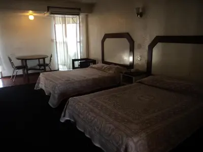 Cama o camas de una habitación en Hotel San Luis de Nogales