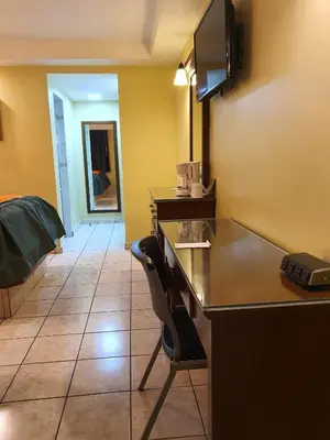 Una televisión o centro de entretenimiento en Hotel Marques de Cima