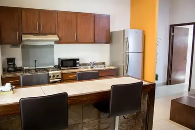 Una cocina o zona de cocina en Madison Suites