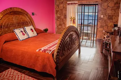 Cama o camas de una habitación en Hotel Divisadero Barrancas