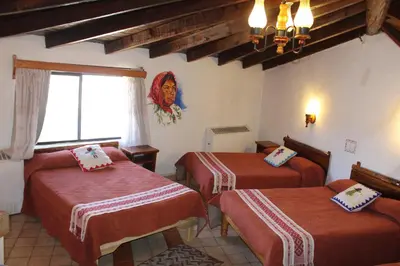 Cama o camas de una habitación en Hotel Divisadero Barrancas