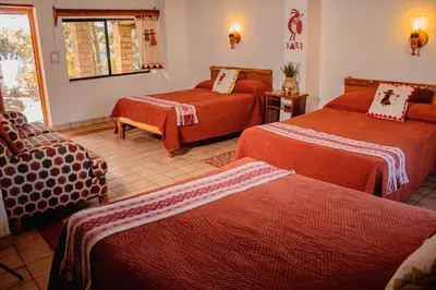 Cama o camas de una habitación en Hotel Divisadero Barrancas