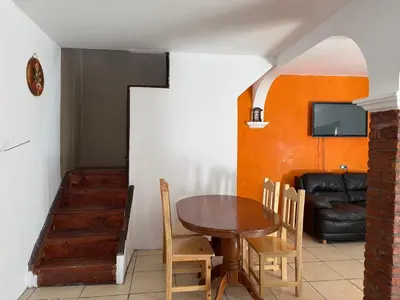 Zona de estar de Cabañas el Pino 0