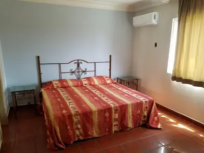 Cama o camas de una habitación en Hotel Playa María