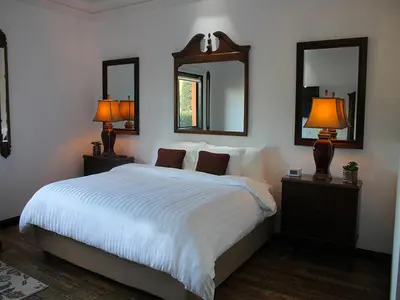Cama o camas de una habitación en Hotel Boutique Villa Toscana