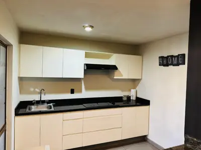 Una cocina o zona de cocina en Zona dorada: amplio departamento para 12