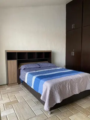 Cama o camas de una habitación en Villas Puerto Iguanas, Marina Mazatlán