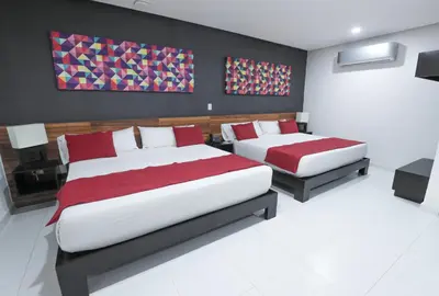 Cama o camas de una habitación en Hotel Dwana