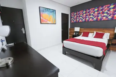 Cama o camas de una habitación en Hotel Dwana