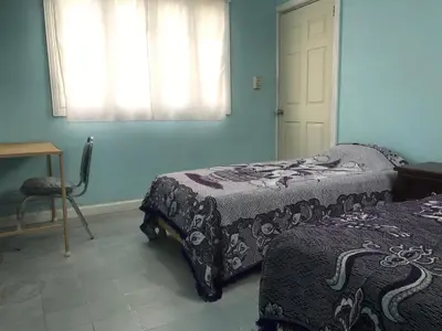 Cama o camas de una habitación en Hotel Fundadores Torreón
