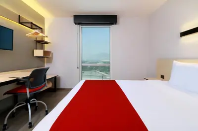 Cama o camas de una habitación en City Express by Marriott Guaymas