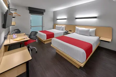 Cama o camas de una habitación en City Express by Marriott Guaymas