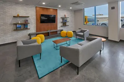 Una televisión o centro de entretenimiento en City Express by Marriott Guaymas