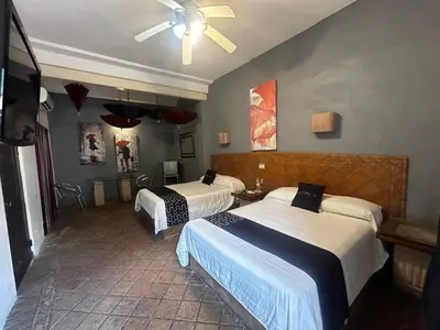 Cama o camas de una habitación en Hotel Olimpia Centro Histórico
