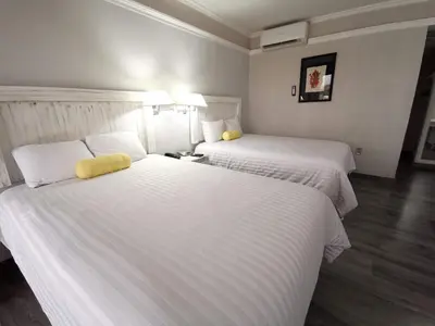 Cama o camas de una habitación en Paraíso Express