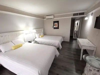 Cama o camas de una habitación en Paraíso Express