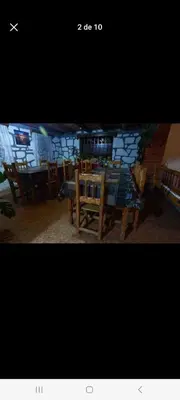 Una televisión o centro de entretenimiento en Cabañas De Lolita En Barrancas del cobre