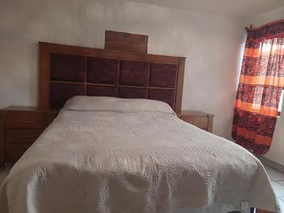 Cama o camas de una habitación en Casa Nopal Tu casa vacacional tipo hotel