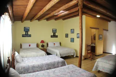 Cama o camas de una habitación en Hotel Paraiso del Oso