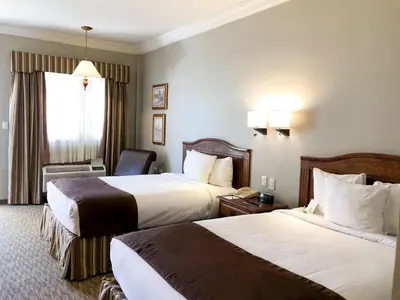 Cama o camas de una habitación en Fresno Galerias