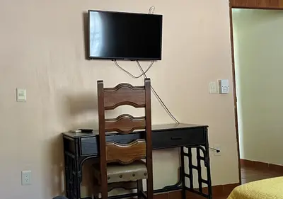 Una televisión o centro de entretenimiento en Casa de la Alegria 2 apartments