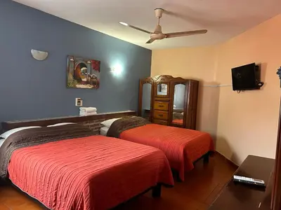 Cama o camas de una habitación en Casa de la Alegria 2 apartments